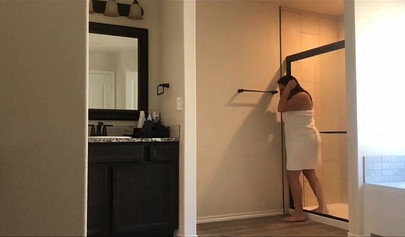 Hot 22 year old brunette Jessica gets spied on in the bathroom