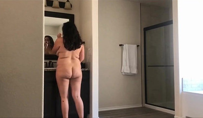 Hot 22 year old brunette Jessica gets spied on in the bathroom