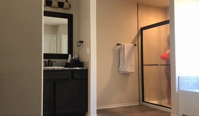 Hot 22 year old brunette Jessica gets spied on in the bathroom