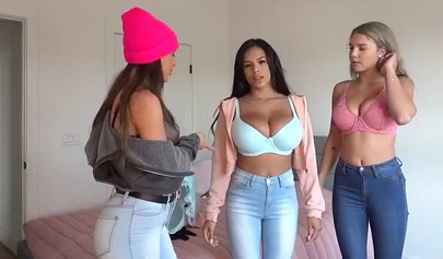 Three big boobed teens strip to their bras and pose seductively