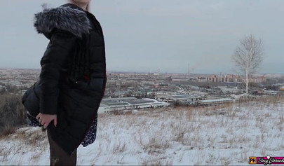 Adorable teen in a fur coat fucks in cold weather and swallows cum