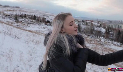 Adorable teen in a fur coat fucks in cold weather and swallows cum