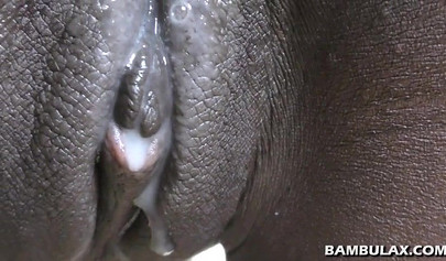 Blindfolded Afro-American teen sucks a white boner and gets her chocolate pussy creampied