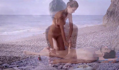 Nude girlfriend Charlotta milks her boyfriend's penis on the beach