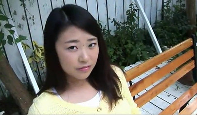 Delicious Japanese teen removes her panties in public and rubs her bald pussy