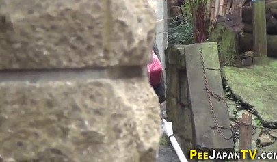 Shameless Asian teen babes caught peeing in public