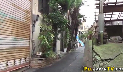 Shameless Asian teen babes caught peeing in public