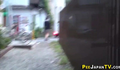 Shameless Asian teen babes caught peeing in public