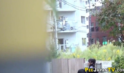 Shameless Asian teen babes caught peeing in public