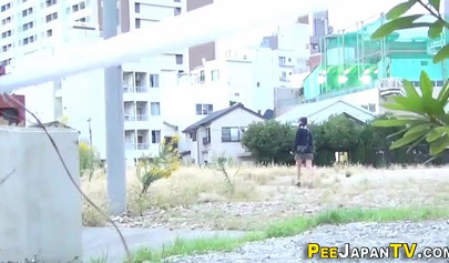 Shameless Asian teen babes caught peeing in public