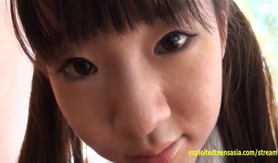 Sexy Japanese teen Arisa Mirai playing with her pussy on the sandy beach