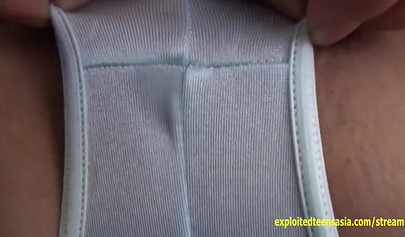 Sexy Japanese teen Arisa Mirai playing with her pussy on the sandy beach