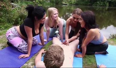 Four sexy yoga babes suck and massage a nice white dick outdoors