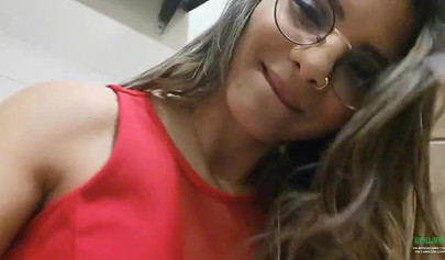 Breathtaking brunette films herself masturbating in public bathroom