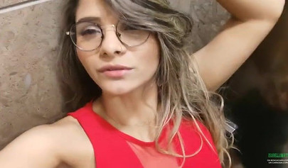 Breathtaking brunette films herself masturbating in public bathroom