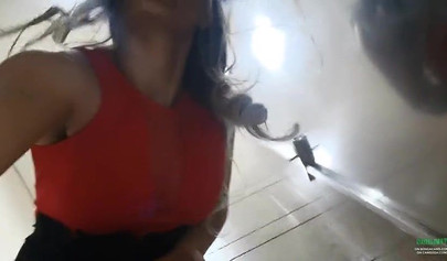 Breathtaking brunette films herself masturbating in public bathroom