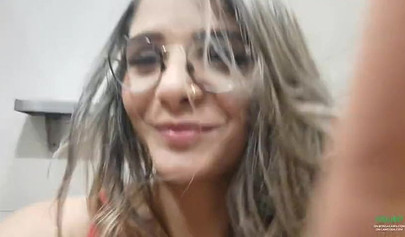 Breathtaking brunette films herself masturbating in public bathroom