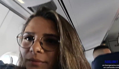 Smoking hot model shows her juicy tits and masturbates in the plane