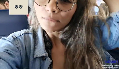 Smoking hot model shows her juicy tits and masturbates in the plane