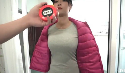 Japanese teen with a great pair of juggs strips and shows her fucking skills