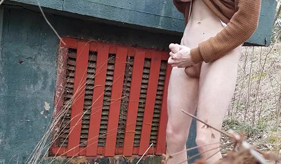 Playful teen catches a big dicked dude masturbating outdoors and helps him cum