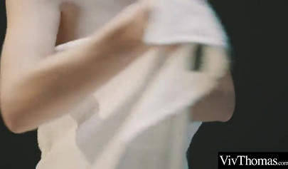 Attractive lesbian masseuse pleasing a big boobed teenage babe on the table