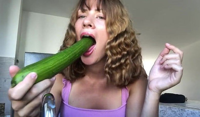 Naughty teen deepthroats a cucumber and inserts it in her asshole