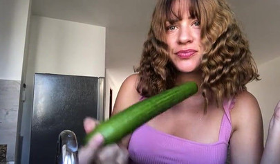 Naughty teen deepthroats a cucumber and inserts it in her asshole