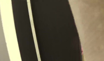 Two amateur girlfriends take care of a hard dick in the changing room