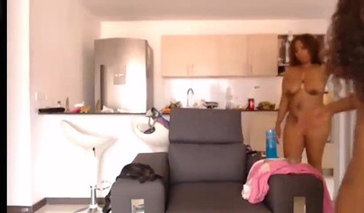 Big boobed ebony sluts fuck each other with a strapon