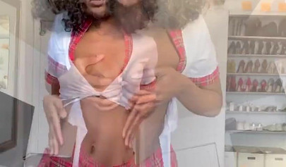 Attractive Afro-American teen stripping and pleasing herself on cam