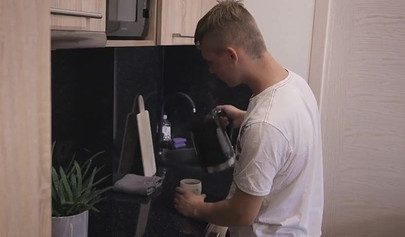 Innocent teenage girlfriend gets spooned on the white sofa