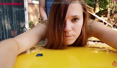 Horny German brunette got her pussy drilled on the car in public