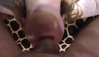 Slutty amateur teen deepthroating stepbrother's big cock on the bed