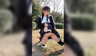 Horny Asian brunette stroking her pussy and squirting in public