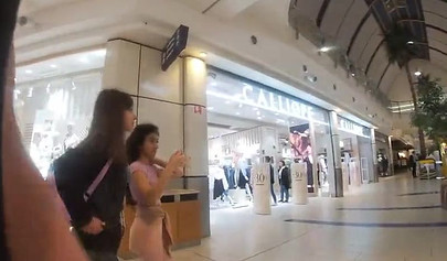 Slutty teen walks around the mall with cum on her face