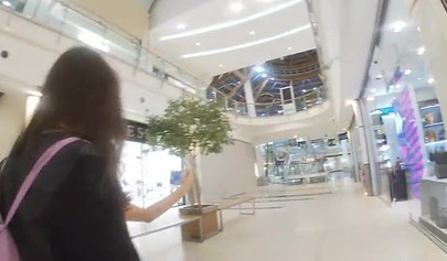 Slutty teen walks around the mall with cum on her face