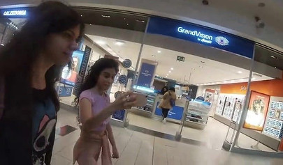 Slutty teen walks around the mall with cum on her face