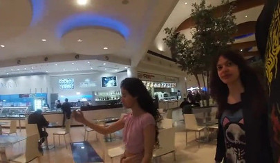 Slutty teen walks around the mall with cum on her face