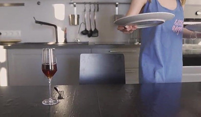 Gorgeous brunette teen sucking a big cock under the diner table