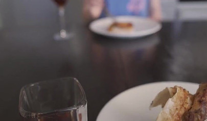 Gorgeous brunette teen sucking a big cock under the diner table