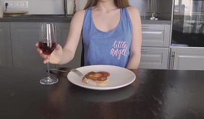 Gorgeous brunette teen sucking a big cock under the diner table