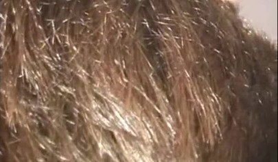 Petite Asian brunette teen fingering her pussy during photoshoot