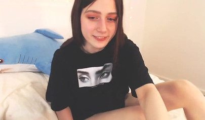 Barely legal teenager rubs her pussy on camera