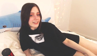 Barely legal teenager rubs her pussy on camera