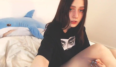 Barely legal teenager rubs her pussy on camera