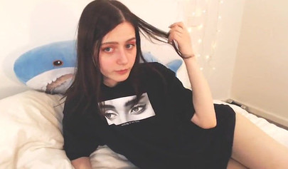 Barely legal teenager rubs her pussy on camera