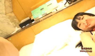 Fingering the Asian slut before nailing her down hard