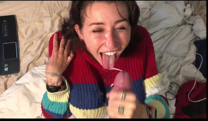 Busty amateur brunette teen giving a sloppy blowjob in bed