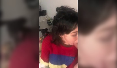 Busty amateur brunette teen giving a sloppy blowjob in bed